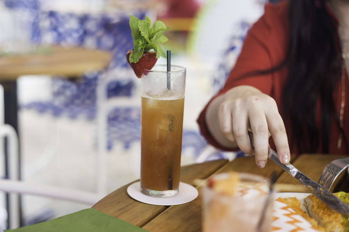 A tall, spicy ginger and strawberry Pimm's cup, designed for beating the Texas heat