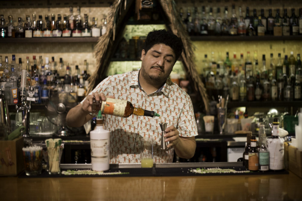 Lei Low bartender David Perez demos the "Junior Colada"