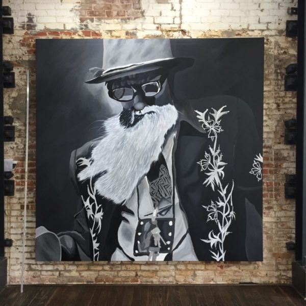 A work in progress: Mike Raymond was still finishing his Billy Gibbons painting when we stopped by to see his new Cottonmouth bar yesterday, April 11, 2018.